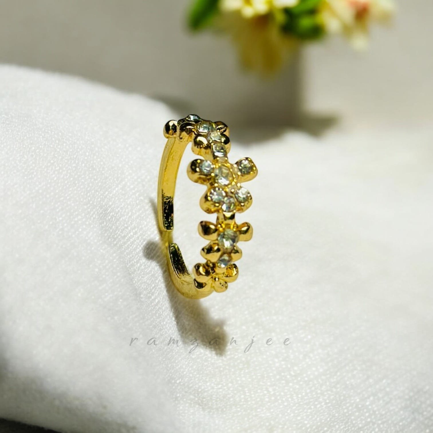 "Elegant diamond engagement ring in a gold band, perfect for weddings."