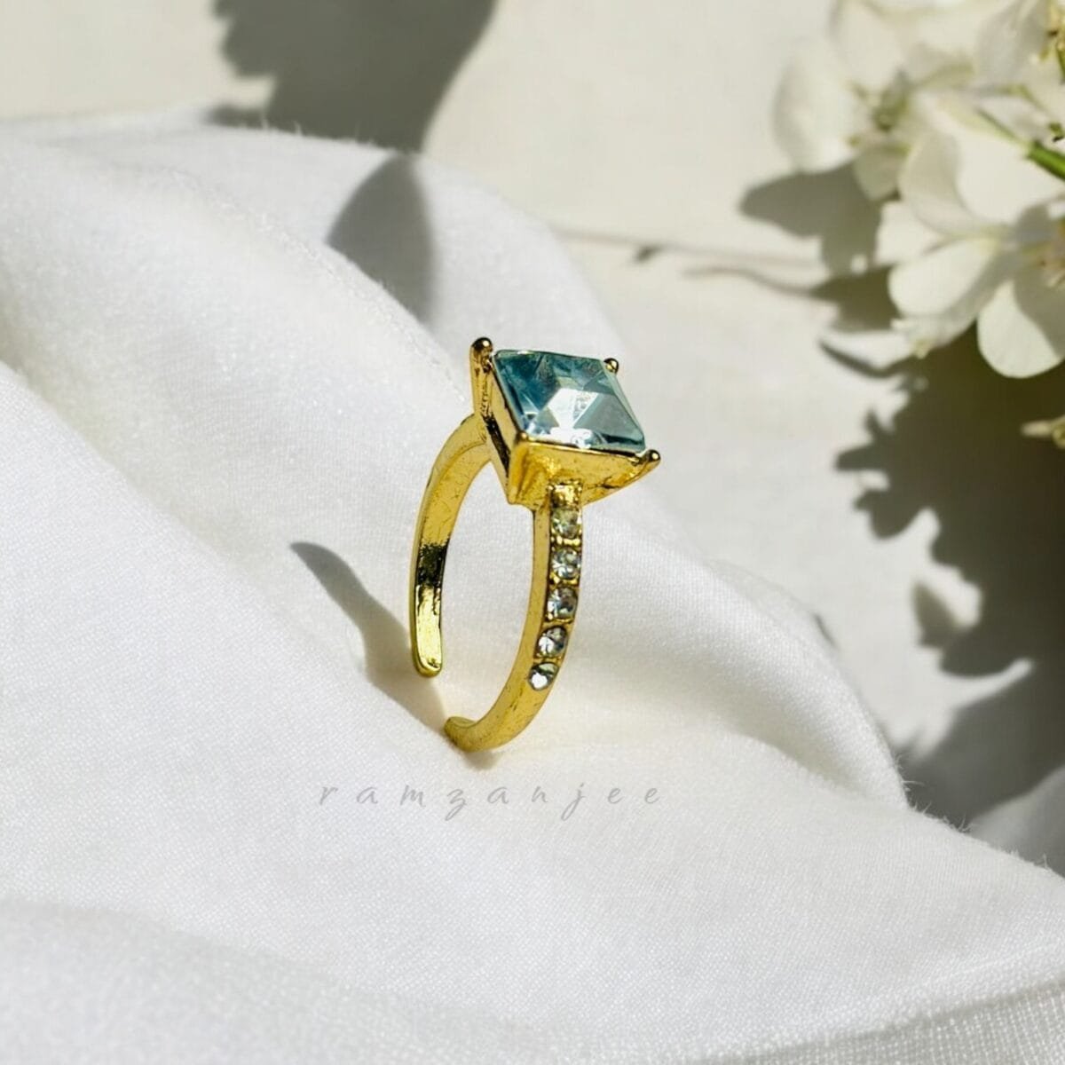 "Elegant diamond engagement ring in a gold band, perfect for weddings."