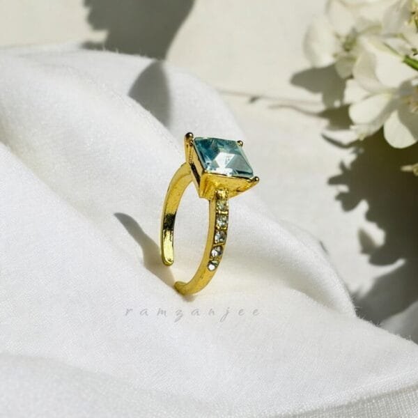 "Elegant diamond engagement ring in a gold band, perfect for weddings."