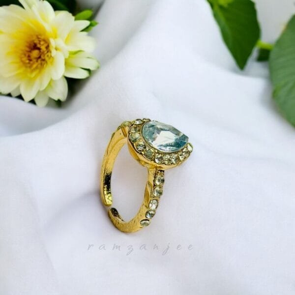 "Elegant diamond engagement ring in a gold band, perfect for weddings."