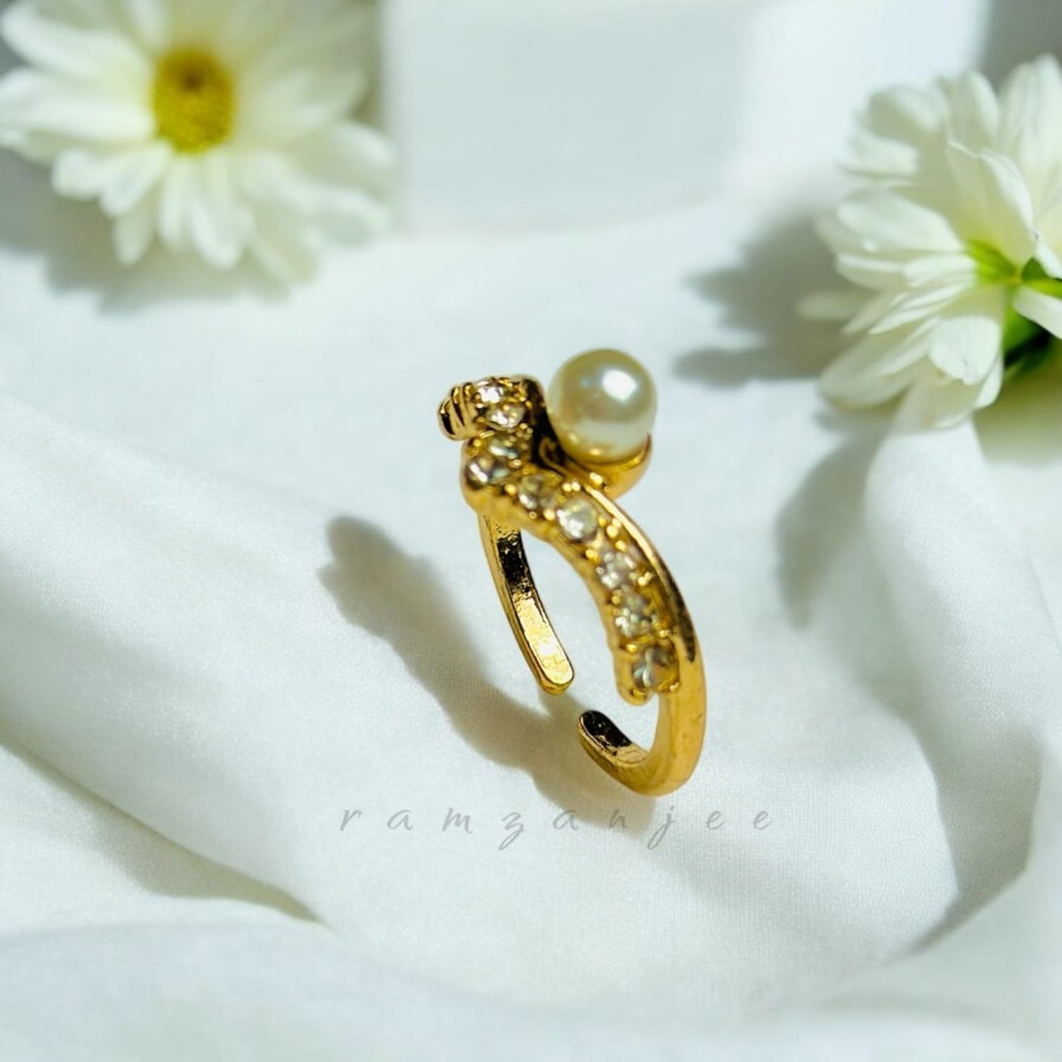 "Elegant diamond engagement ring in a gold band, perfect for weddings."