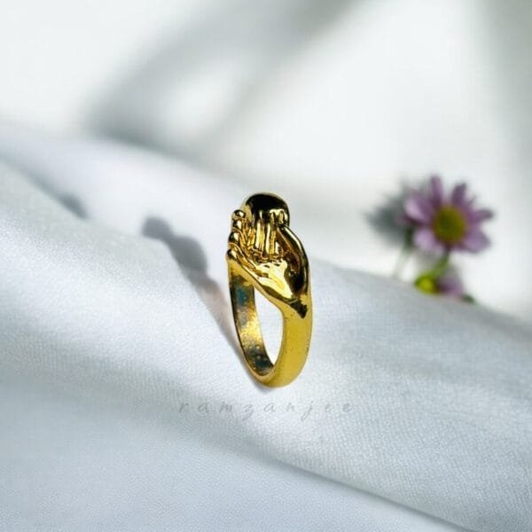 "Elegant diamond engagement ring in a gold band, perfect for weddings."