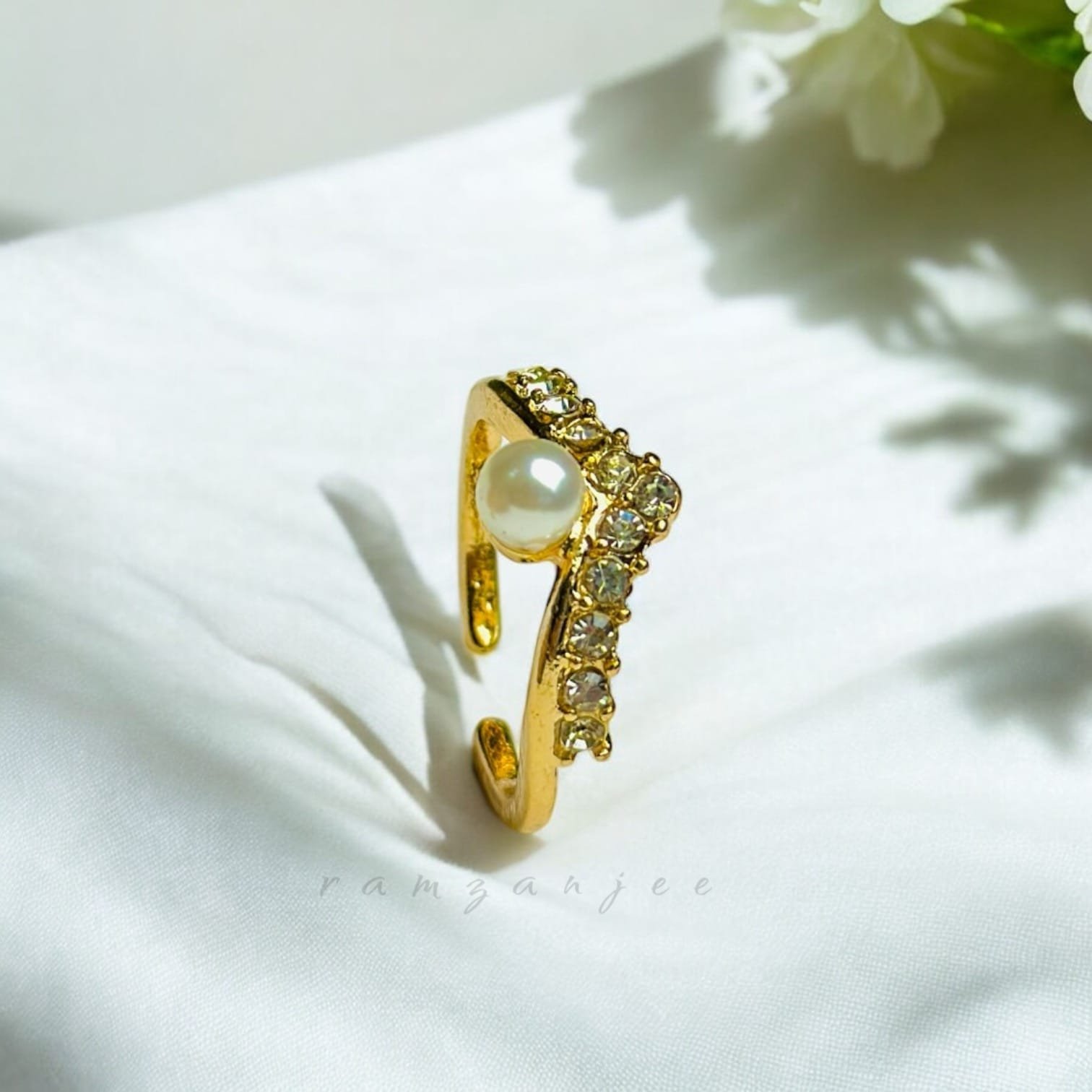 "Elegant diamond engagement ring in a gold band, perfect for weddings."