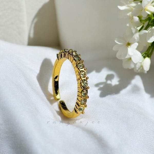 "Elegant diamond engagement ring in a gold band, perfect for weddings."
