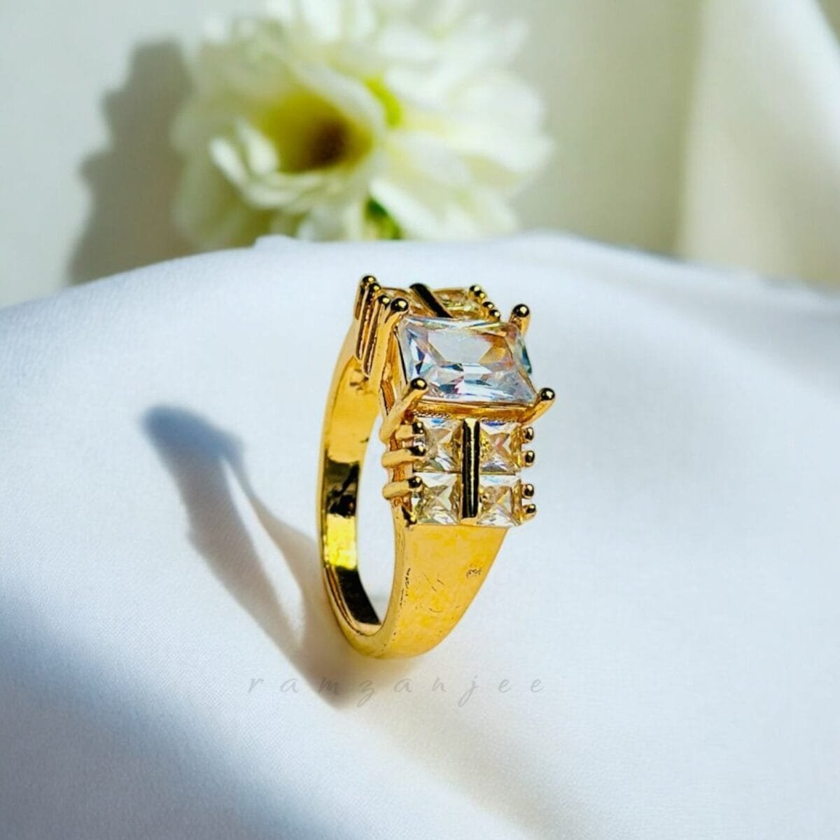 "Elegant diamond engagement ring in a gold band, perfect for weddings."