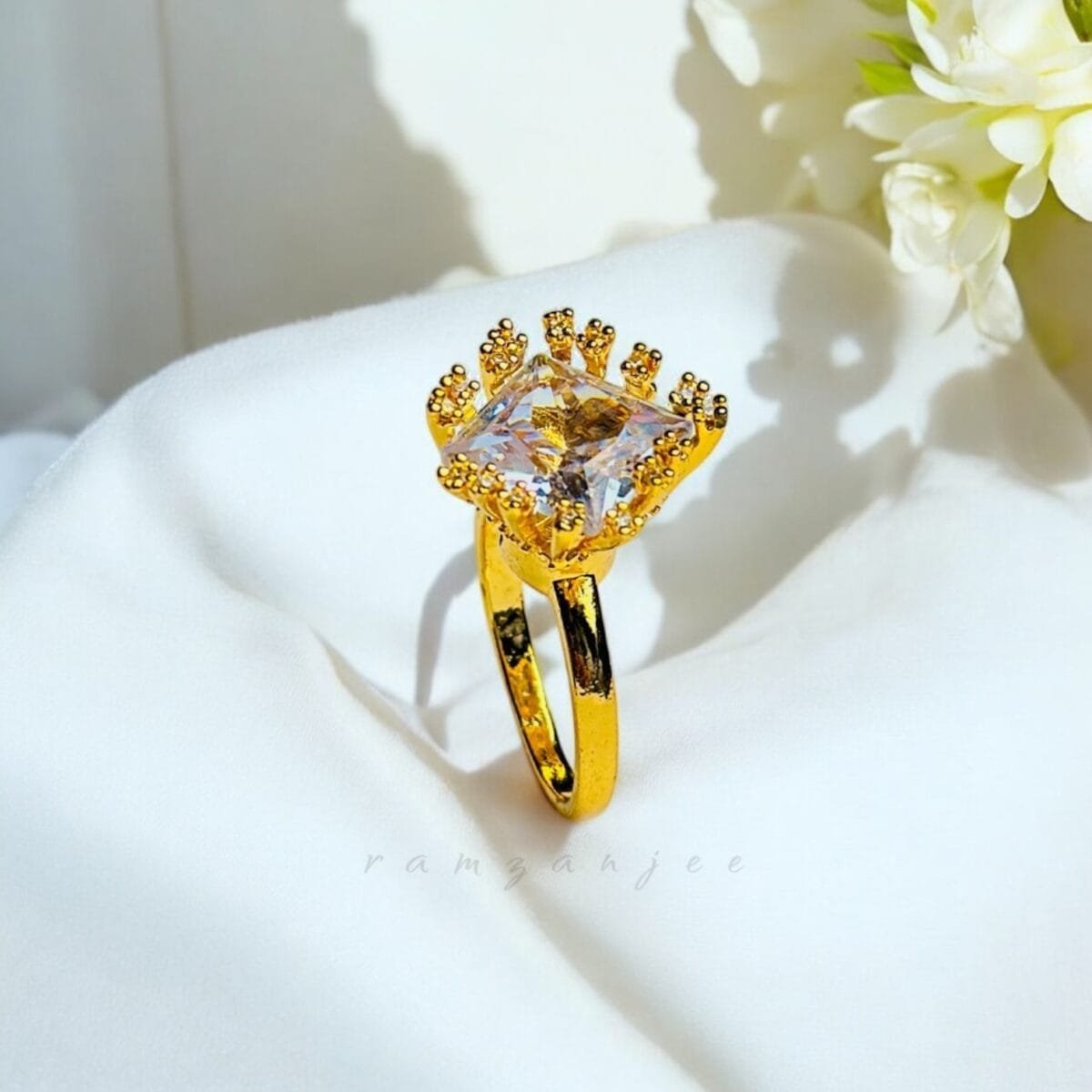 "Elegant diamond engagement ring in a gold band, perfect for weddings."
