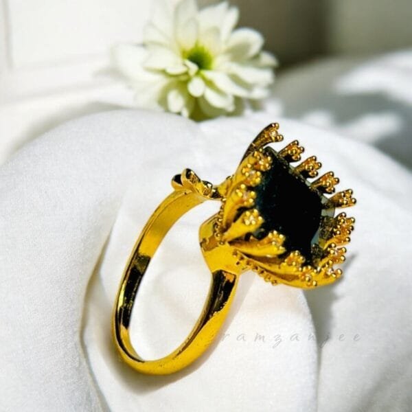 "Elegant diamond engagement ring in a gold band, perfect for weddings."
