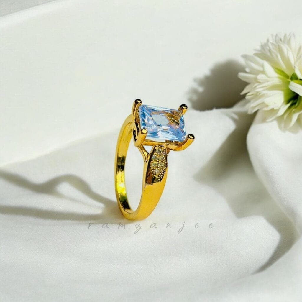 "Elegant diamond engagement ring in a gold band, perfect for weddings."
