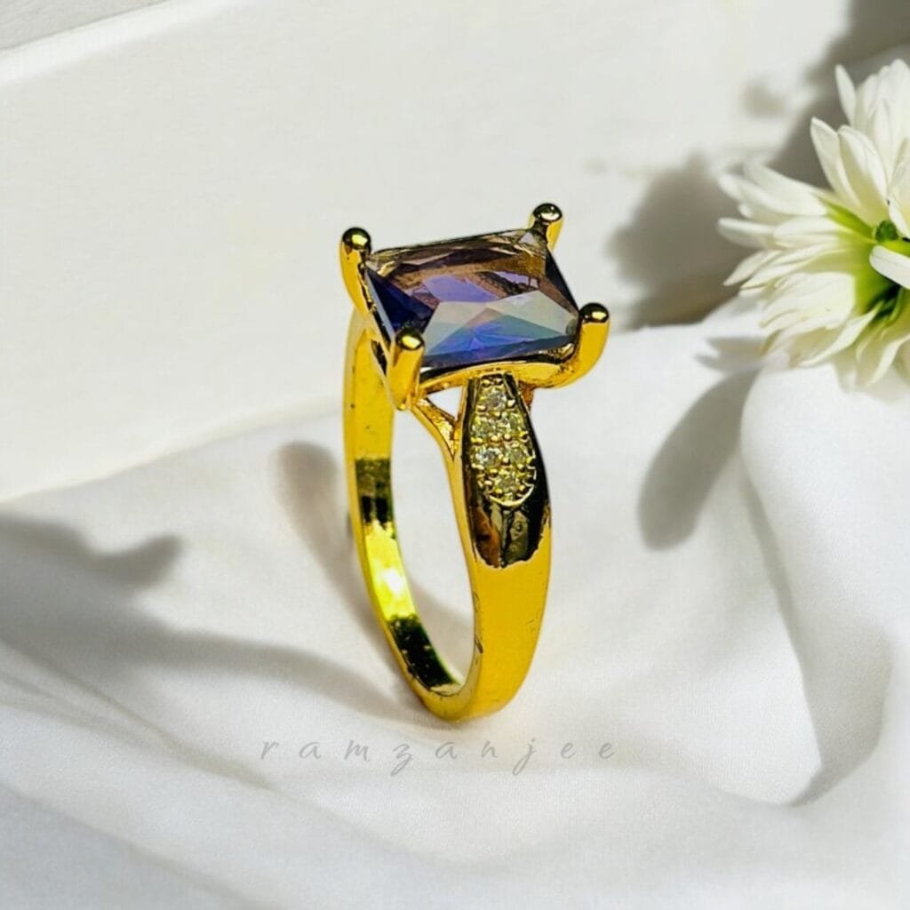 "Elegant diamond engagement ring in a gold band, perfect for weddings."