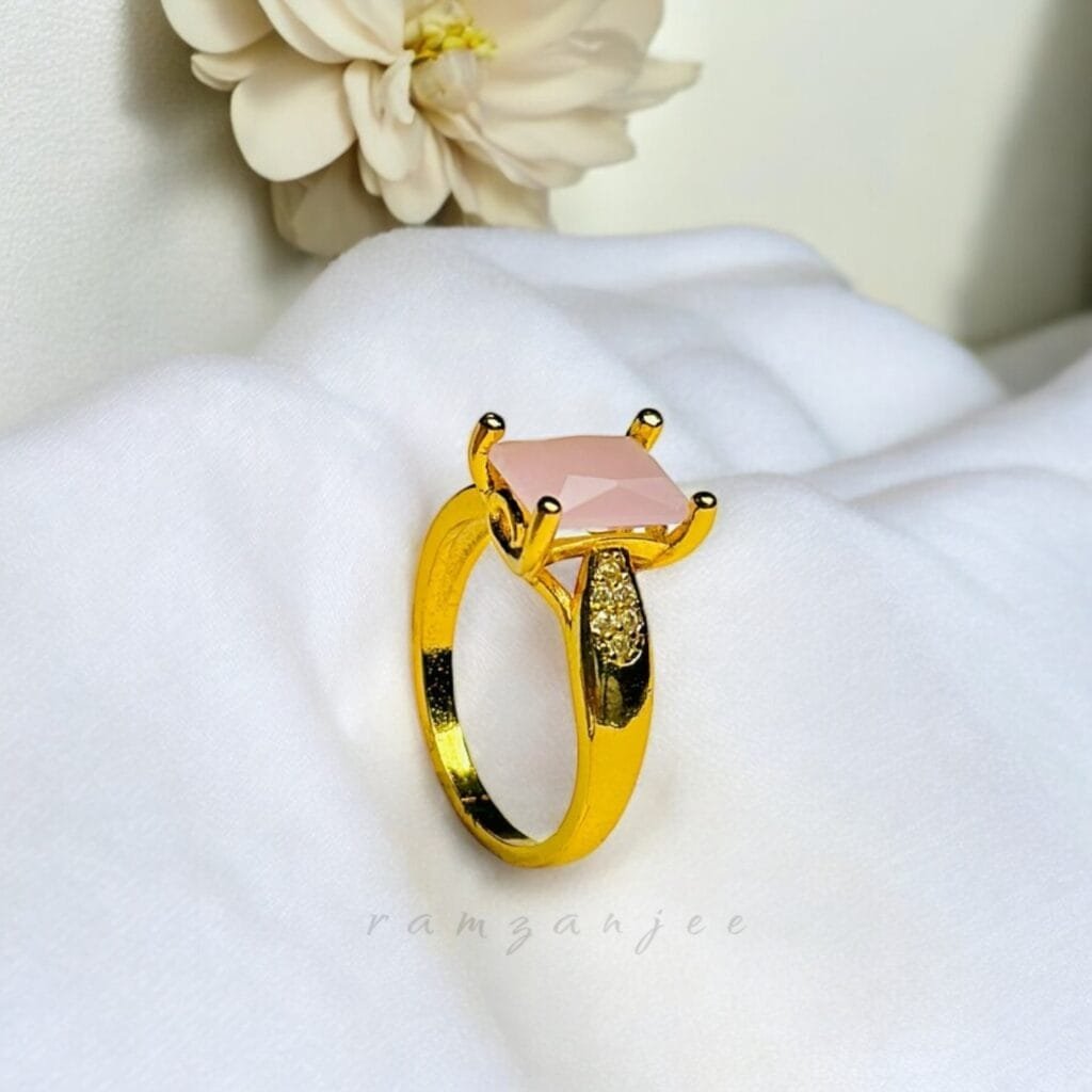 "Elegant diamond engagement ring in a gold band, perfect for weddings."