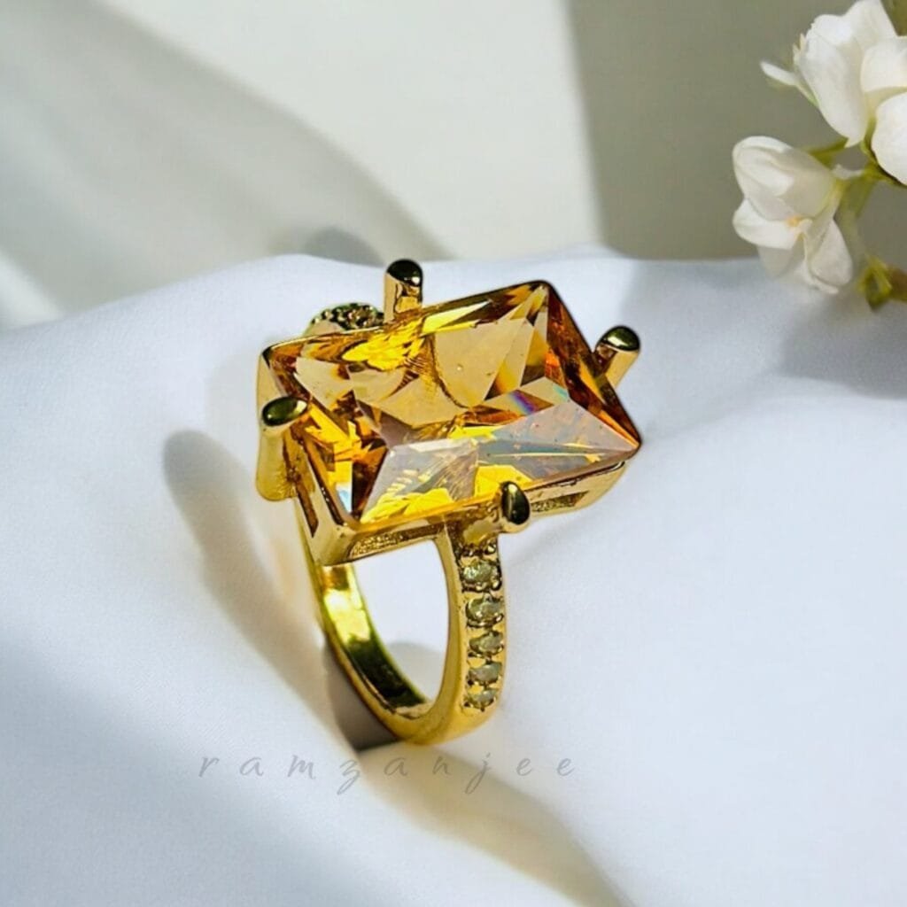 "Elegant diamond engagement ring in a gold band, perfect for weddings."
