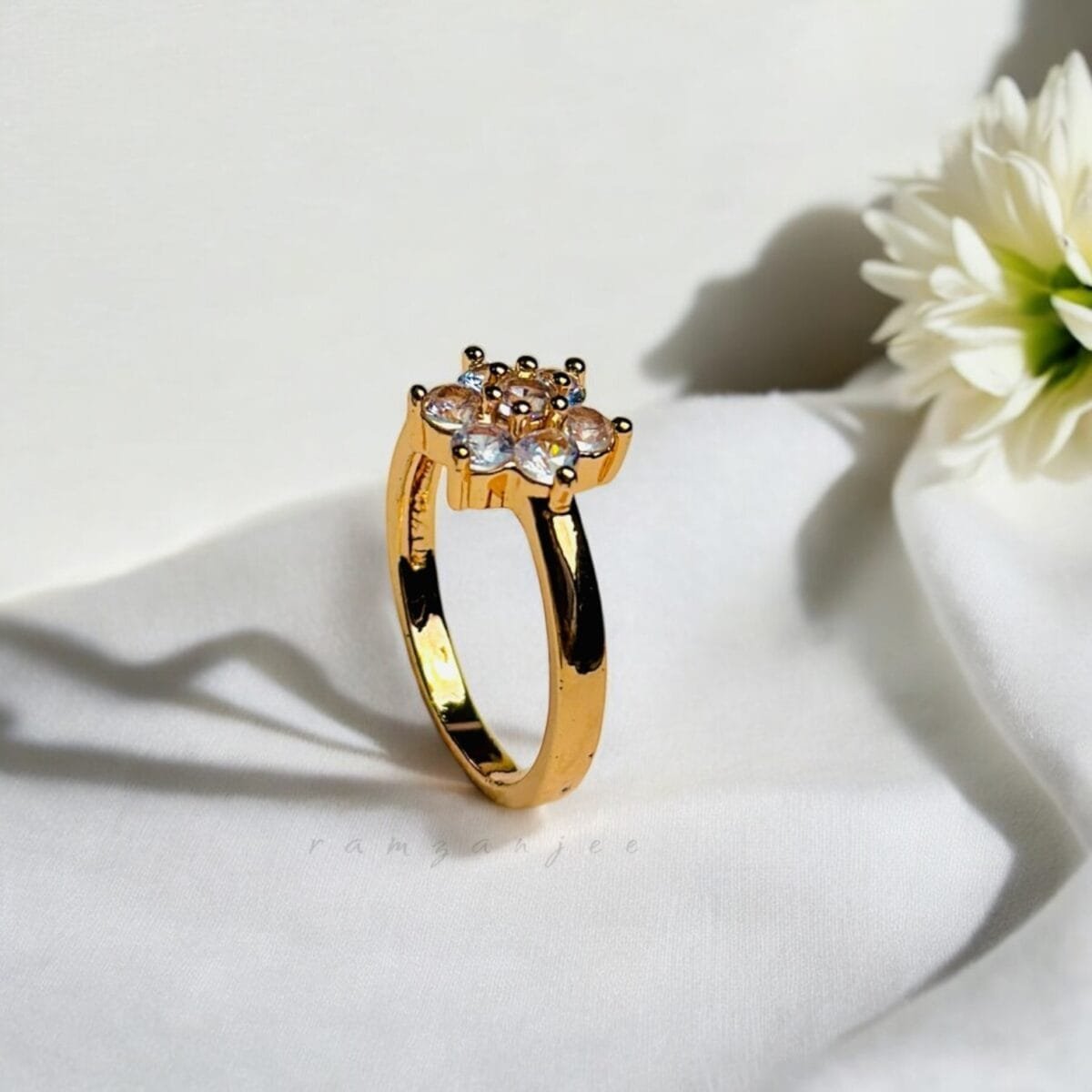 "Elegant diamond engagement ring in a gold band, perfect for weddings."