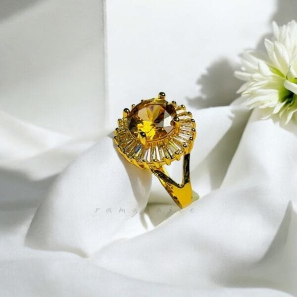 "Elegant diamond engagement ring in a gold band, perfect for weddings."