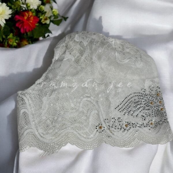 "Premium hijab cap preventing hair damage and offering a smooth base."