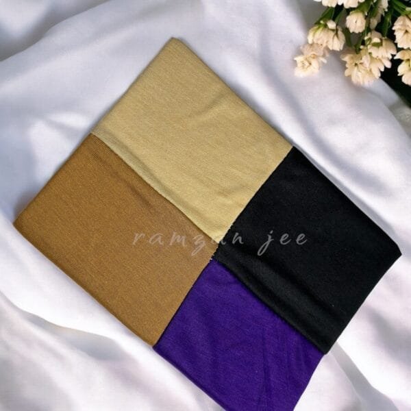 "Lightweight and colorful hijab cap, ideal for layering under silk or chiffon hijabs."