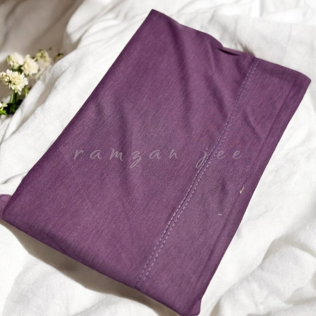 "Lightweight and colorful hijab cap, ideal for layering under silk or chiffon hijabs."