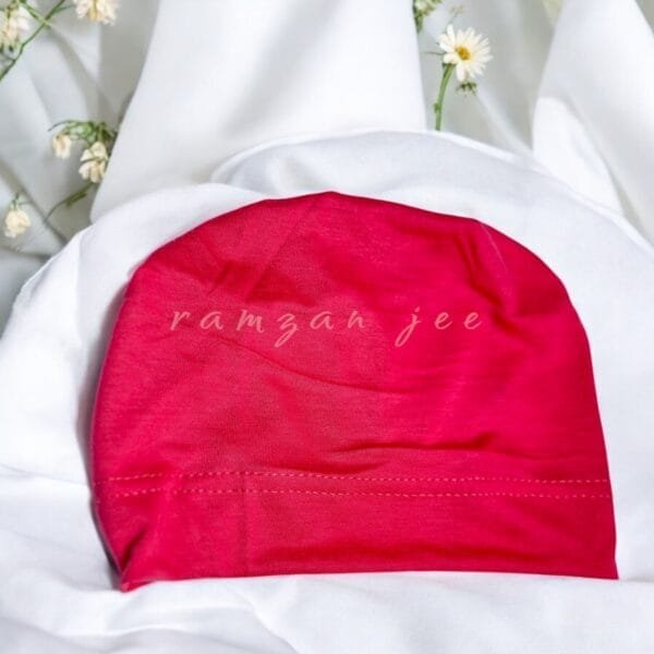 "Lightweight and colorful hijab cap, ideal for layering under silk or chiffon hijabs."