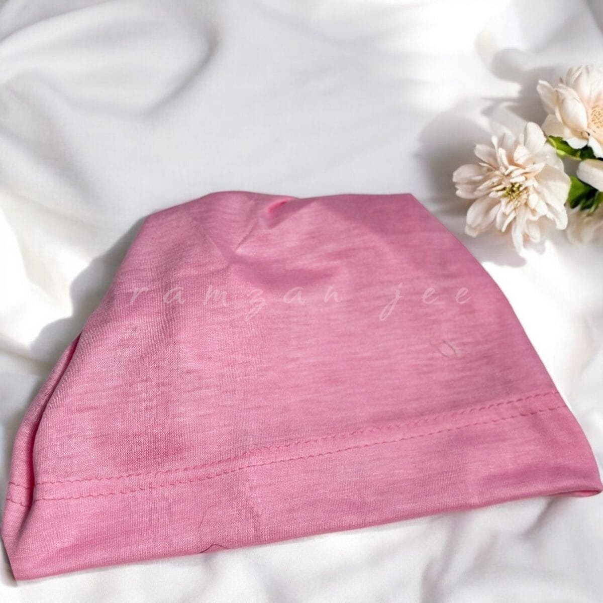 "Lightweight and colorful hijab cap, ideal for layering under silk or chiffon hijabs."