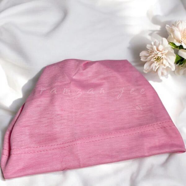"Lightweight and colorful hijab cap, ideal for layering under silk or chiffon hijabs."