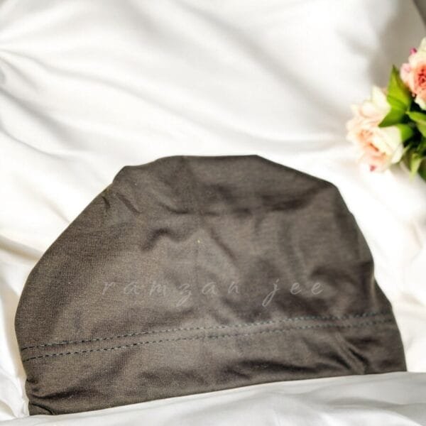 "Lightweight and colorful hijab cap, ideal for layering under silk or chiffon hijabs."