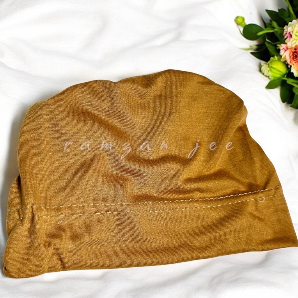 "Lightweight and colorful hijab cap, ideal for layering under silk or chiffon hijabs."