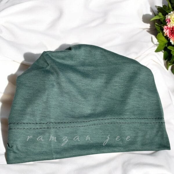 "Lightweight and colorful hijab cap, ideal for layering under silk or chiffon hijabs."
