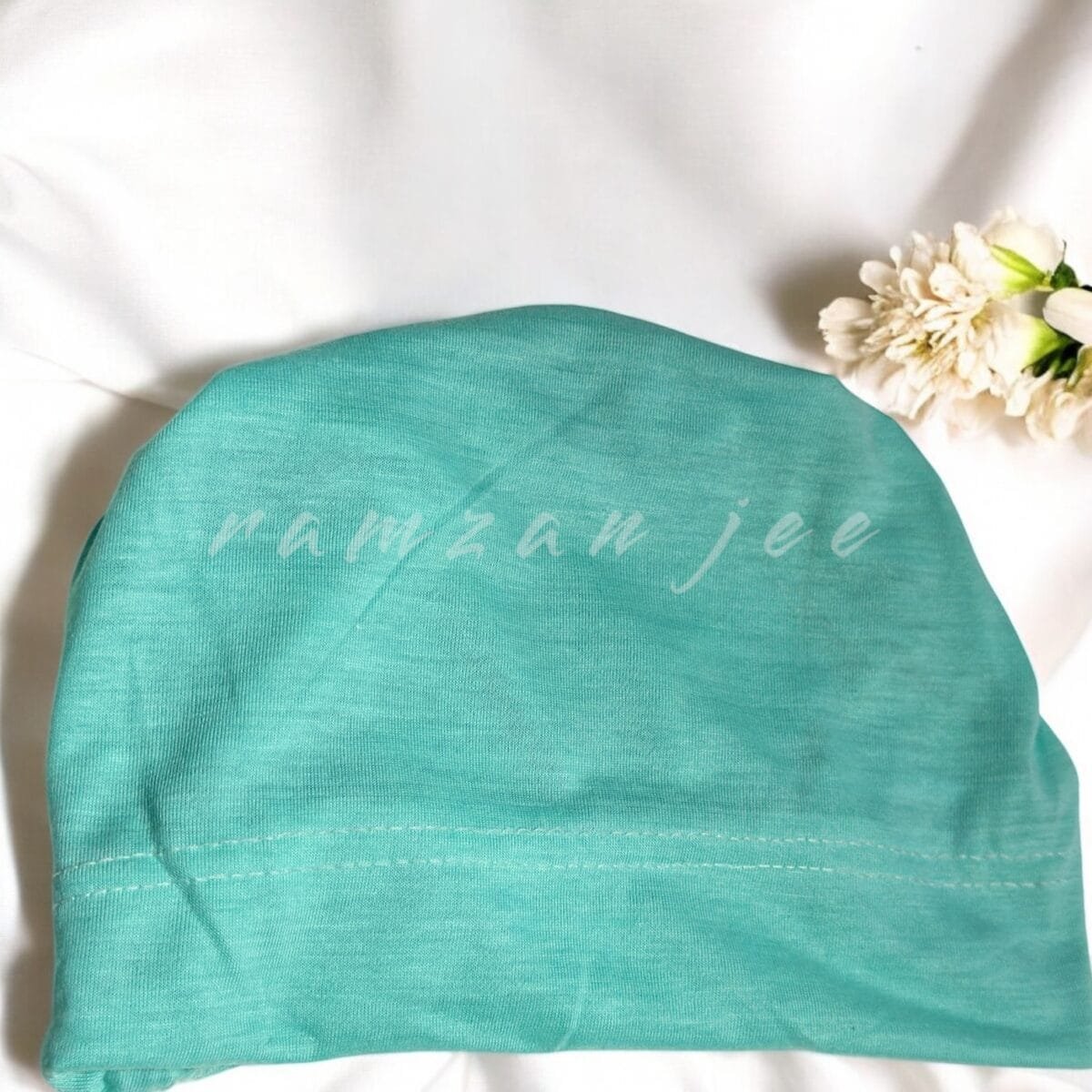 "Lightweight and colorful hijab cap, ideal for layering under silk or chiffon hijabs."