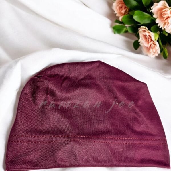 "Lightweight and colorful hijab cap, ideal for layering under silk or chiffon hijabs."