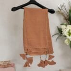 "Eco-friendly hijab made from organic cotton, offering comfort and style with a sustainable design."