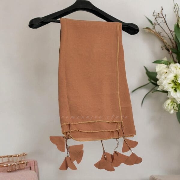 "Eco-friendly hijab made from organic cotton, offering comfort and style with a sustainable design."