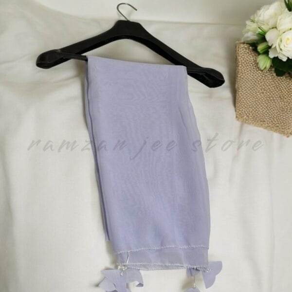 "Eco-friendly hijab made from organic cotton, offering comfort and style with a sustainable design."